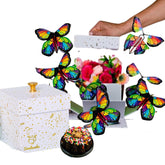 Celebration explosion gift box with flying butterflies and chocolate bundt cake