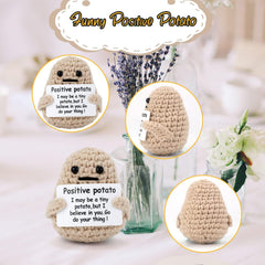 A cute potato plush toy with a smiling face; handmade crochet design for a charming and positive playtime experience