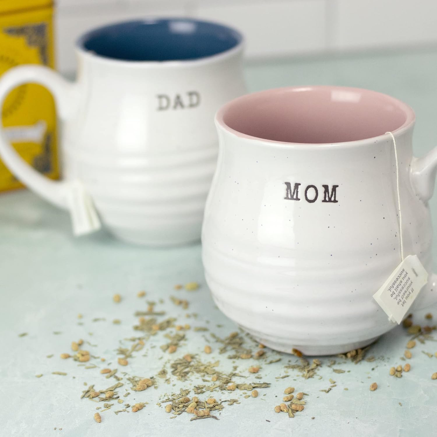 Elegant mom and dad ceramic mugs, with sturdy handles and timeless designs, perfect for everyday use 